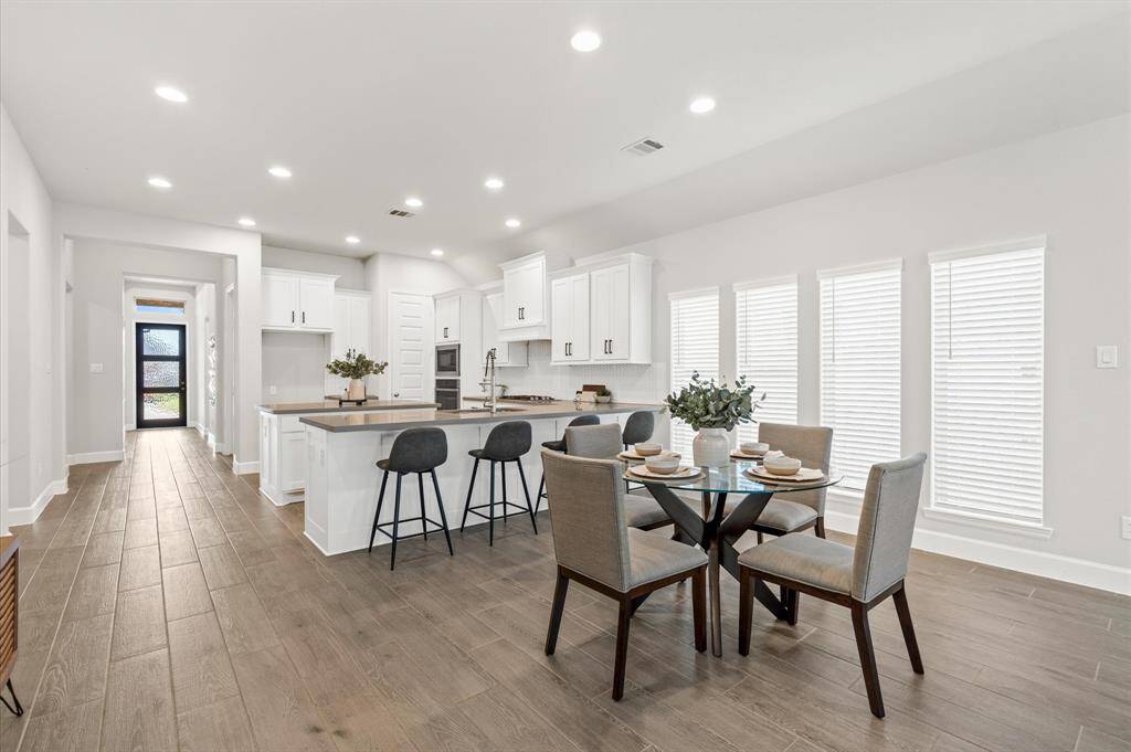 Dining area can accommodate a rectangular table.