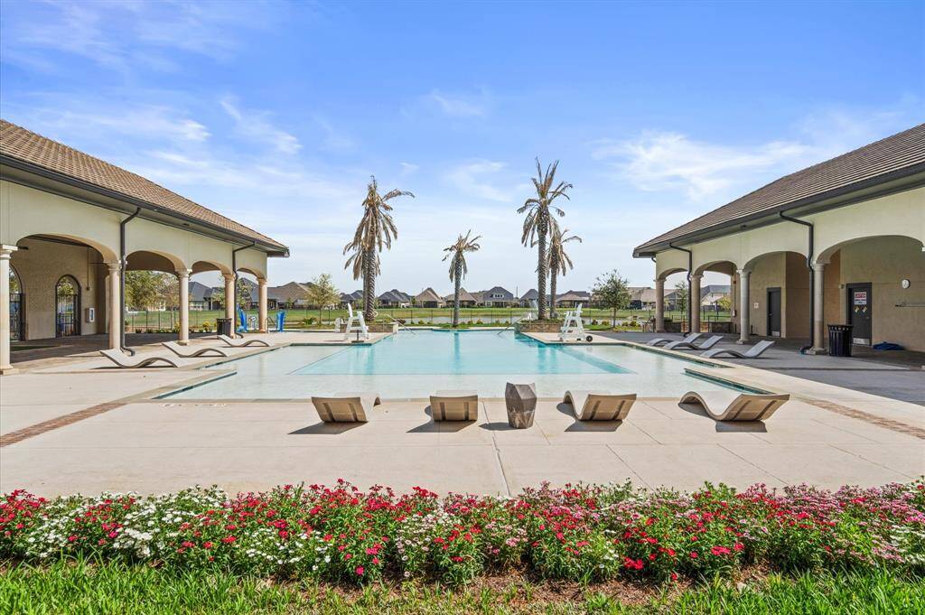 Community pool offers separate areas for adults and children.