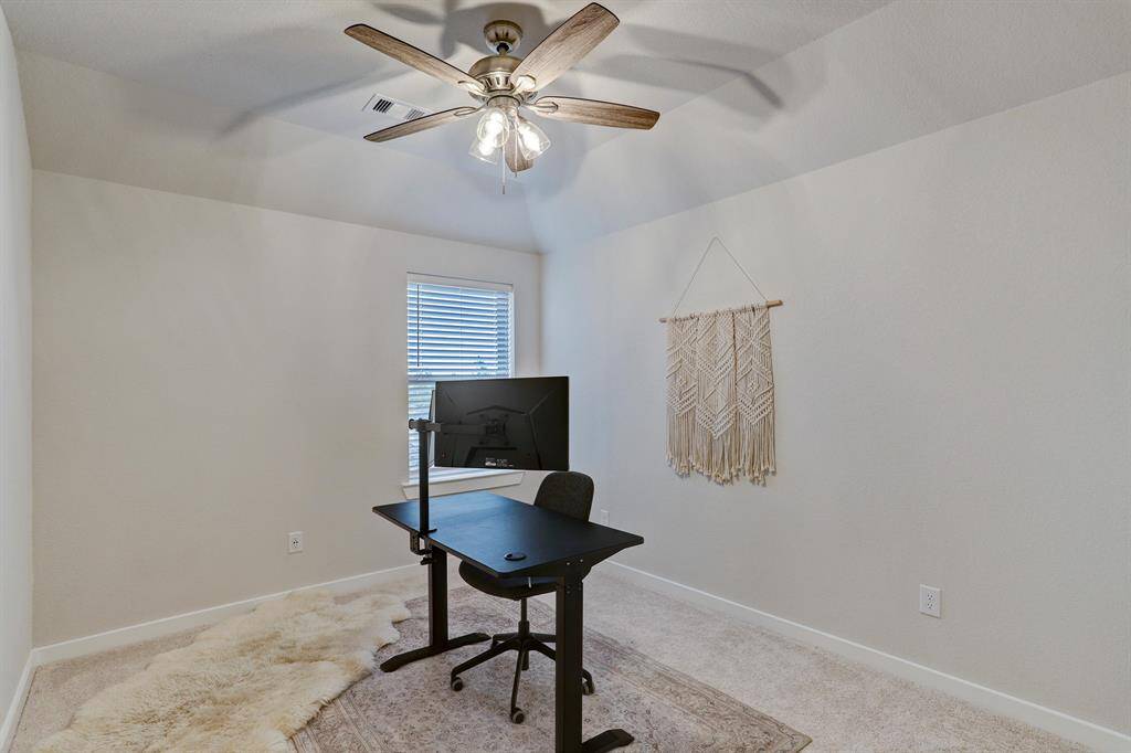 The 2nd-floor secondary bedroom #3 can easily function as a home office.