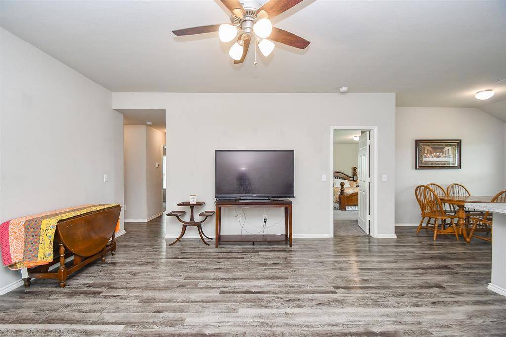 High Ceilings. Large Living Area. Vinyl Wood Plank Floors.
