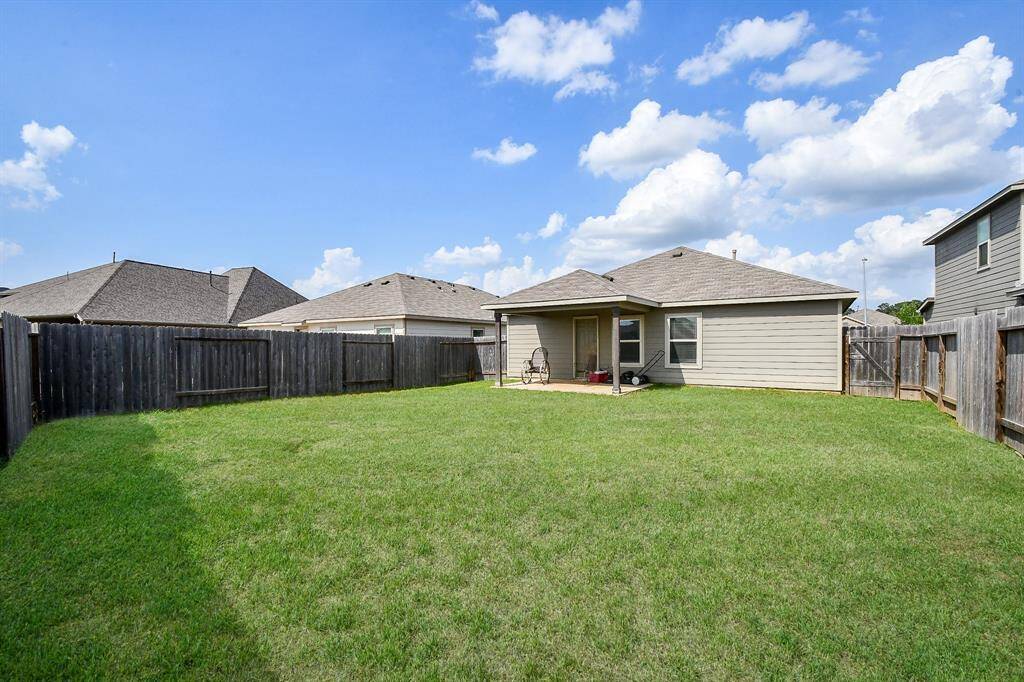 Fully Fenced Large Backyard with NO BACKYARD NEIGHBORS! Approx. 14x10 Covered Back Patio.