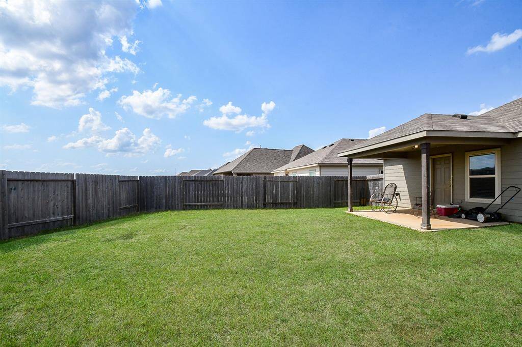 Fully Fenced Large Backyard with NO BACKYARD NEIGHBORS! Approx. 14x10 Covered Back Patio.
