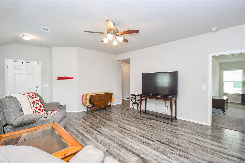 High Ceilings. Large Living Area. Vinyl Wood Plank Floors.
