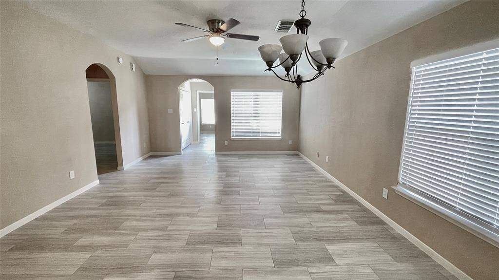 Large living area with blinds