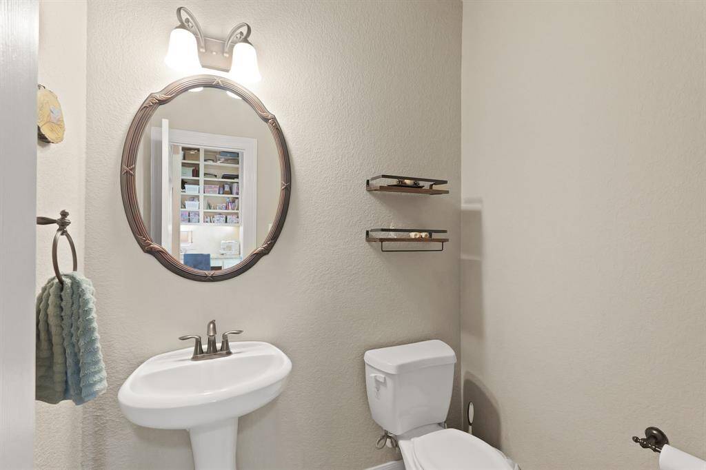 This well-appointed half bathroom is great for when you have family, friends, and guests over.