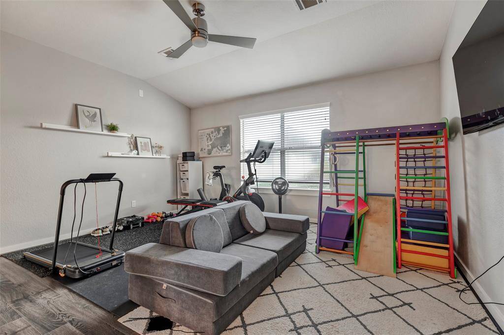 This room on the second floor is perfect for use as a game room.