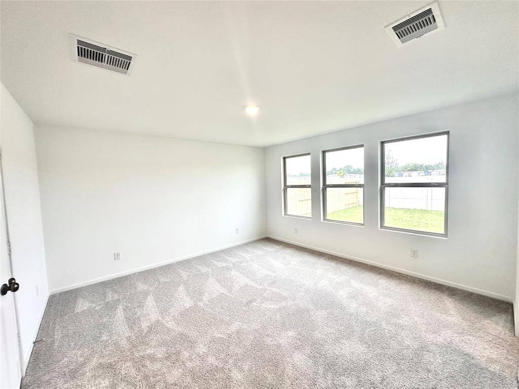 Primary bedroom with two closets