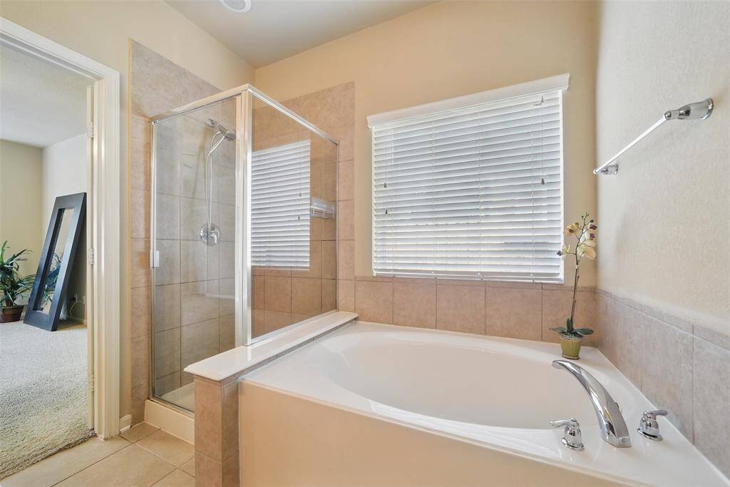 The soaking tub and separate shower provide multiple ways to wash all the stress down the drain.