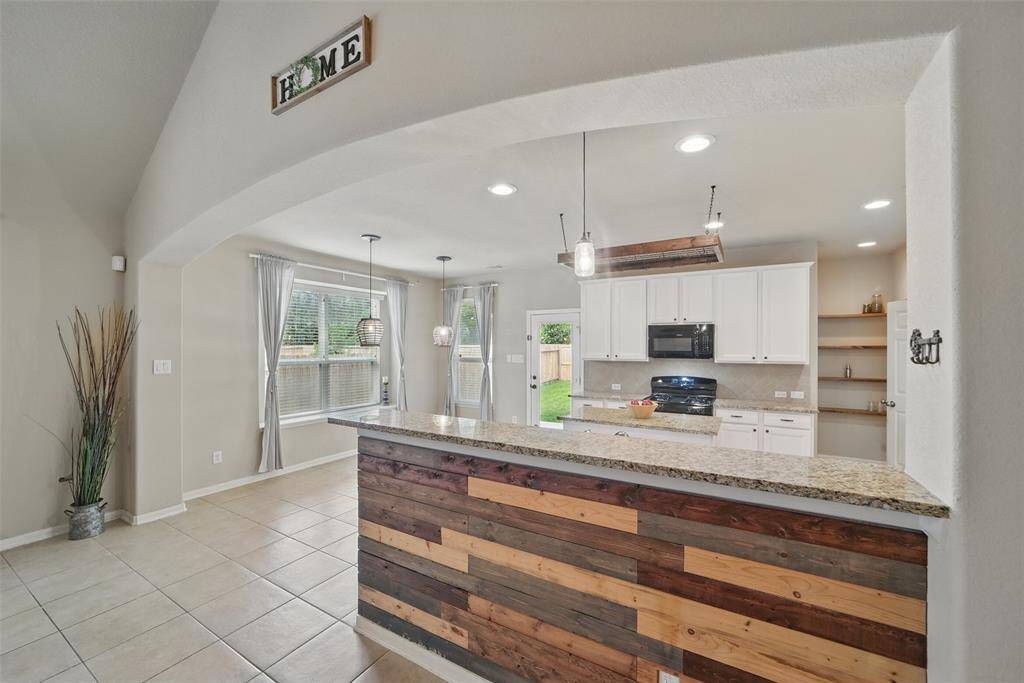 The breakfast bar provides a nice place for quick, informal meals.
