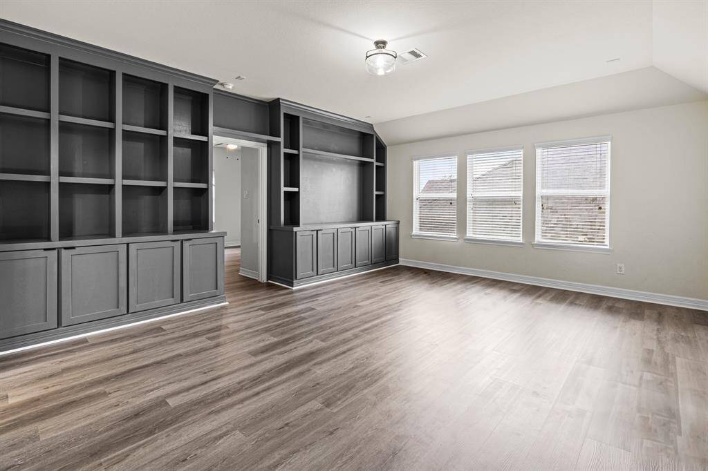 Upstairs family room with built-in bookshelf