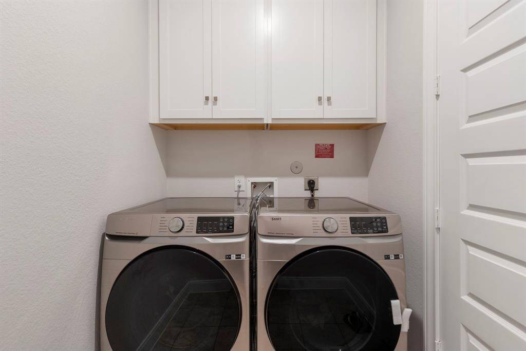 The utility room has extra storage space.