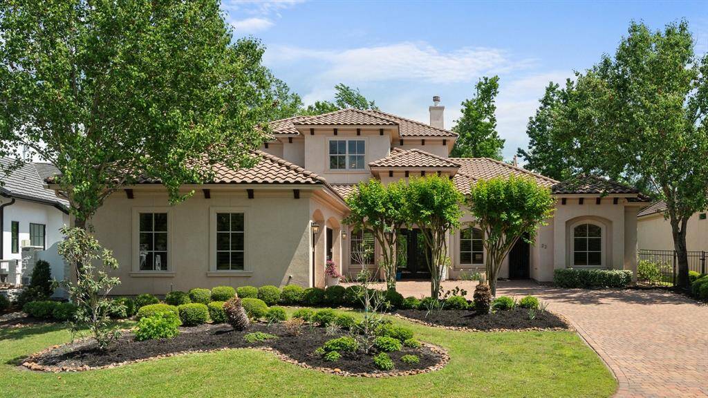 Elegant and updated Kingman Custom Home displays European warmth behind the gates of Carlton Woods Creekside.