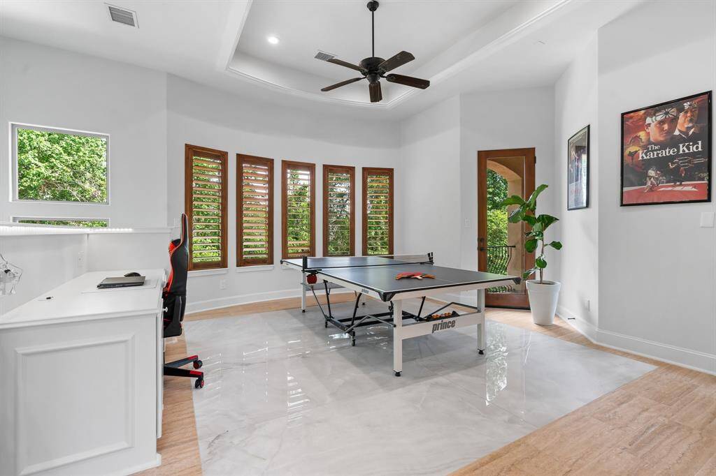 Second floor living will not disappoint! Gorgeous new ceramic tile with durable Hardie backer is ideal for busy game rooms. This fantastic space has quick access to the balcony overlooking the back landscape.