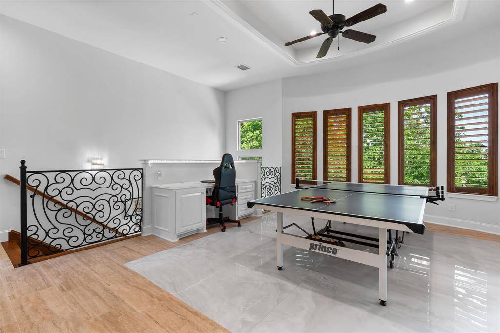 An additional highlight is the built-in computer desk with storage for studying or game time.