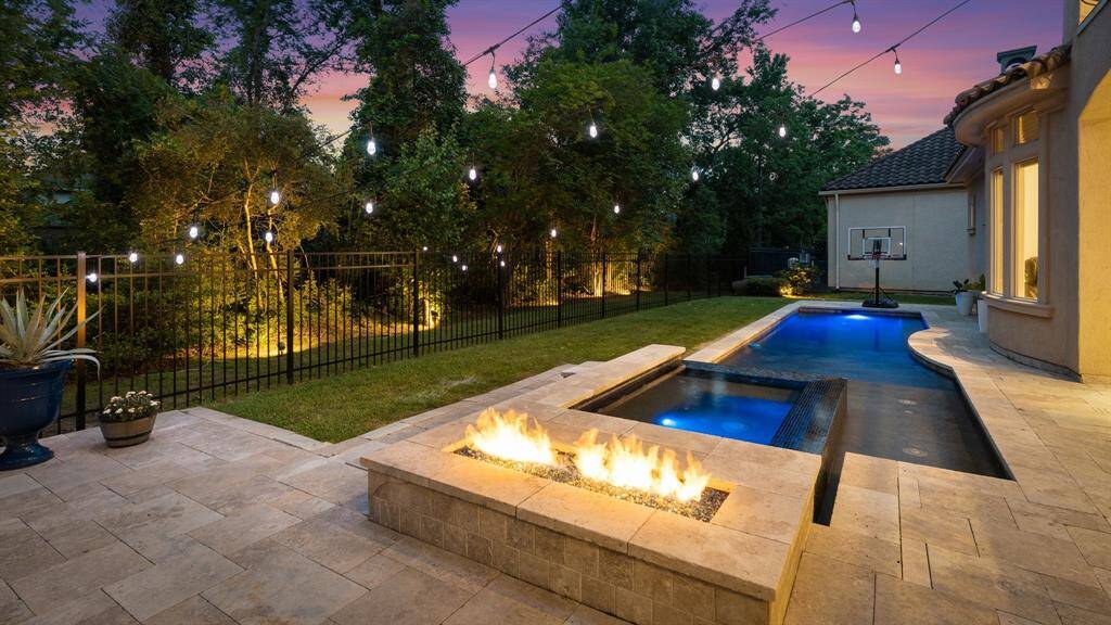 No shortage of ambiance ~ enjoy relaxing fireside or taking an evening dip in the pool.