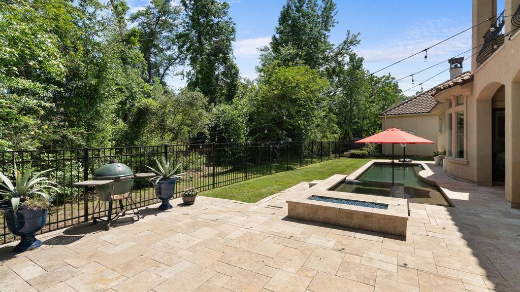 The patio has been extended to create additional space for enjoying the outdoors.