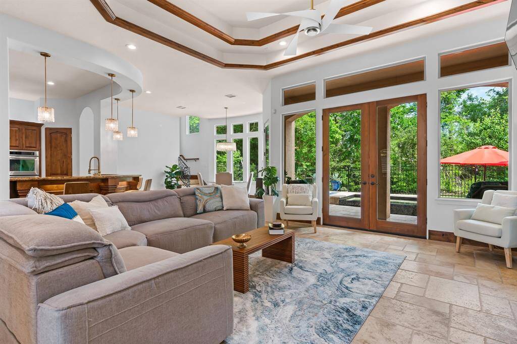 Walls of windows provide generous natural light.