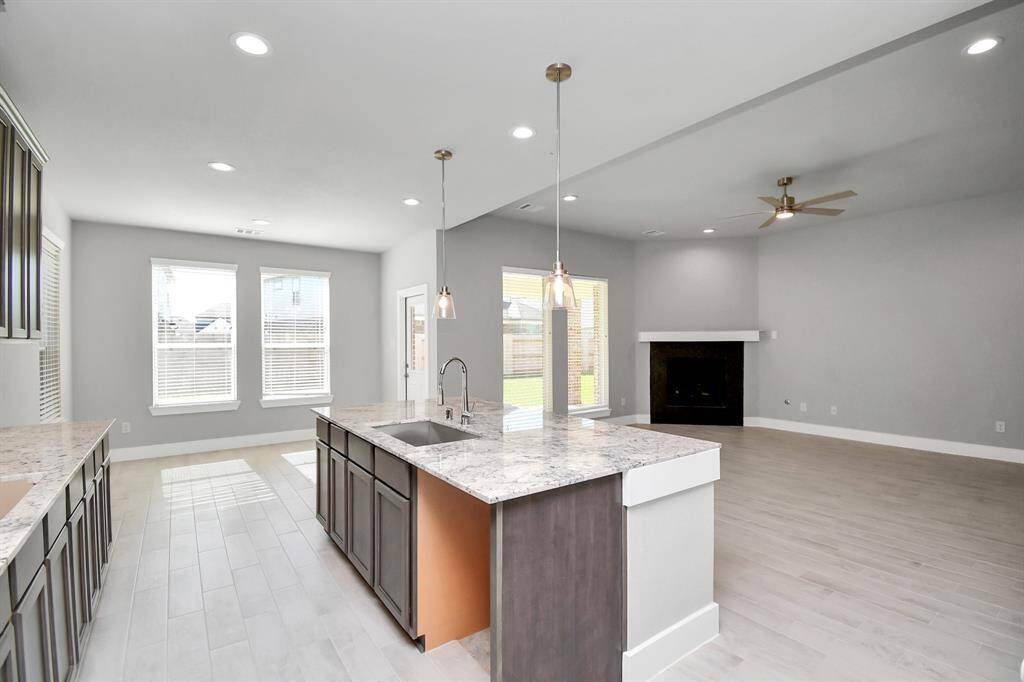 Sample photo of completed home with similar floor plan. Actual colors and selections may vary.