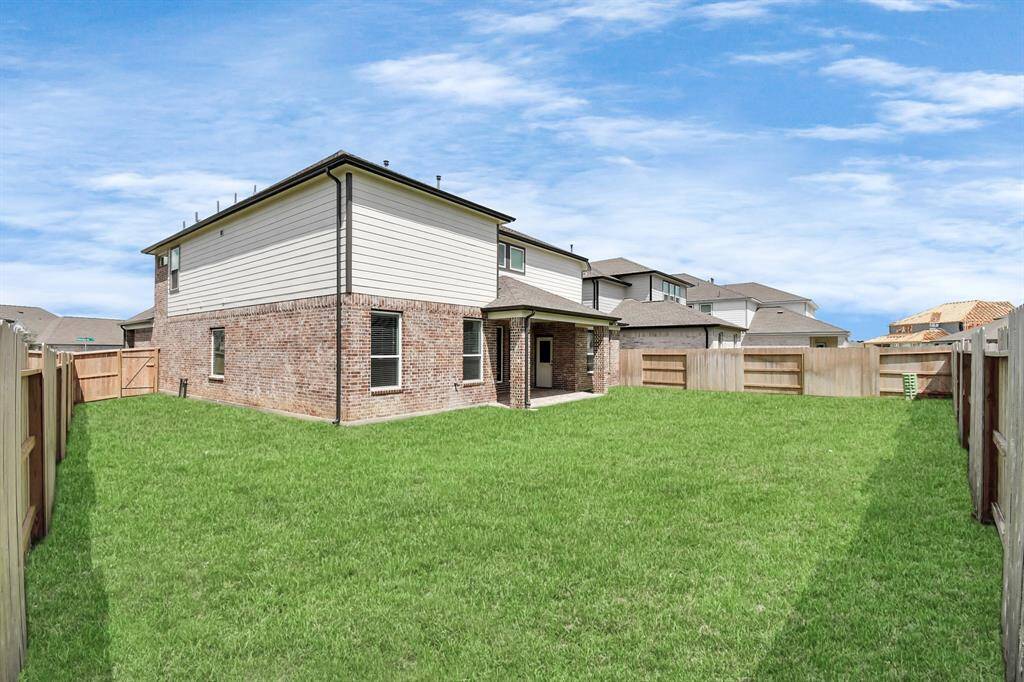 Sample photo of completed home with similar floor plan. Actual colors and selections may vary.