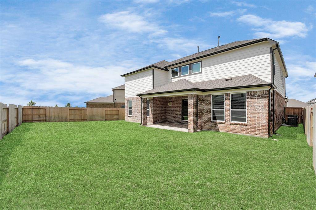 Sample photo of completed home with similar floor plan. Actual colors and selections may vary.