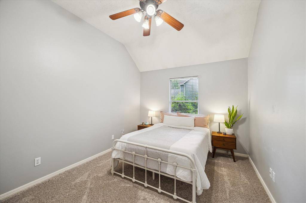 One of three comfortable secondary bedrooms—perfect for family, guests, or a flexible space to fit your needs.
