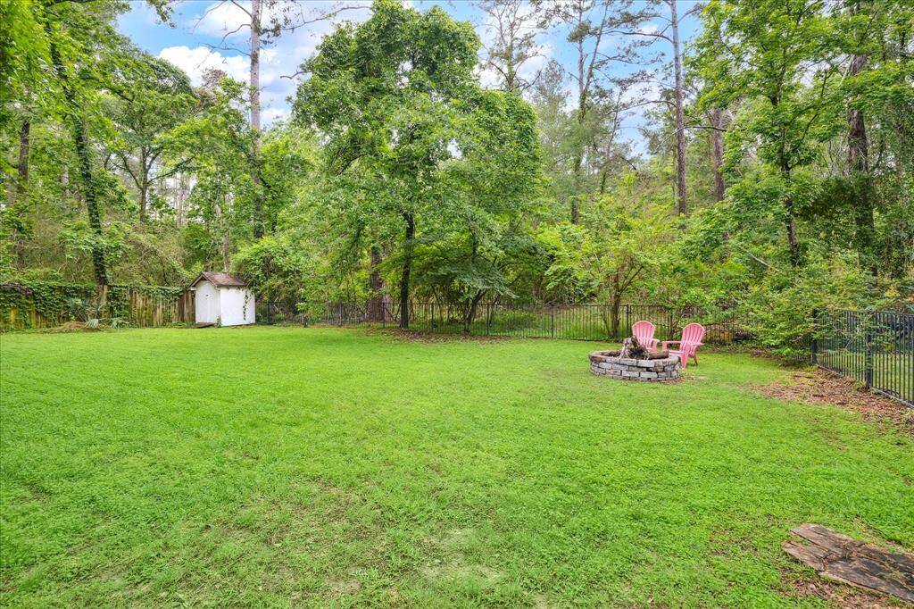 One of the true highlights of this property is the beautiful natural setting—mature trees and serene surroundings that offer a peaceful backdrop to everyday life.