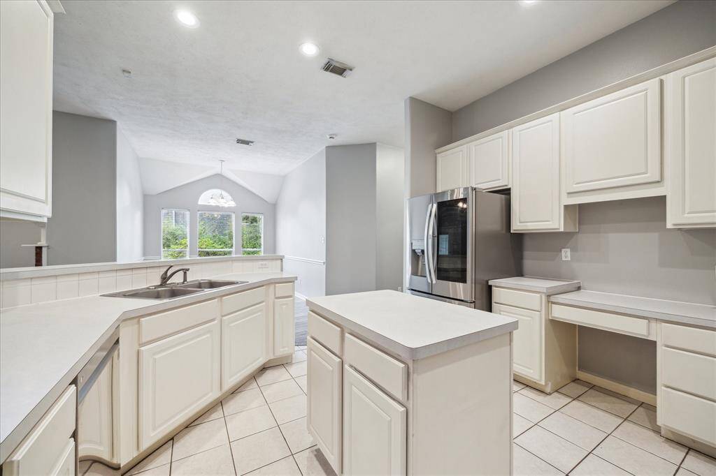 Welcome to your thoughtfully designed kitchen, featuring generous counter space, abundant storage, and sleek stainless steel appliances.