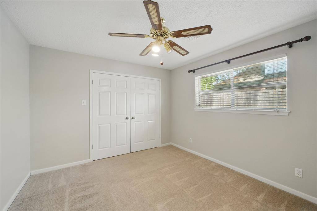Secondary bedroom with large closet.