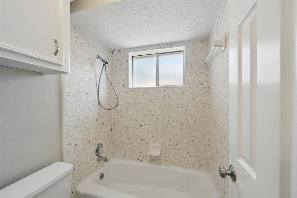 Terrazzo tile shower.