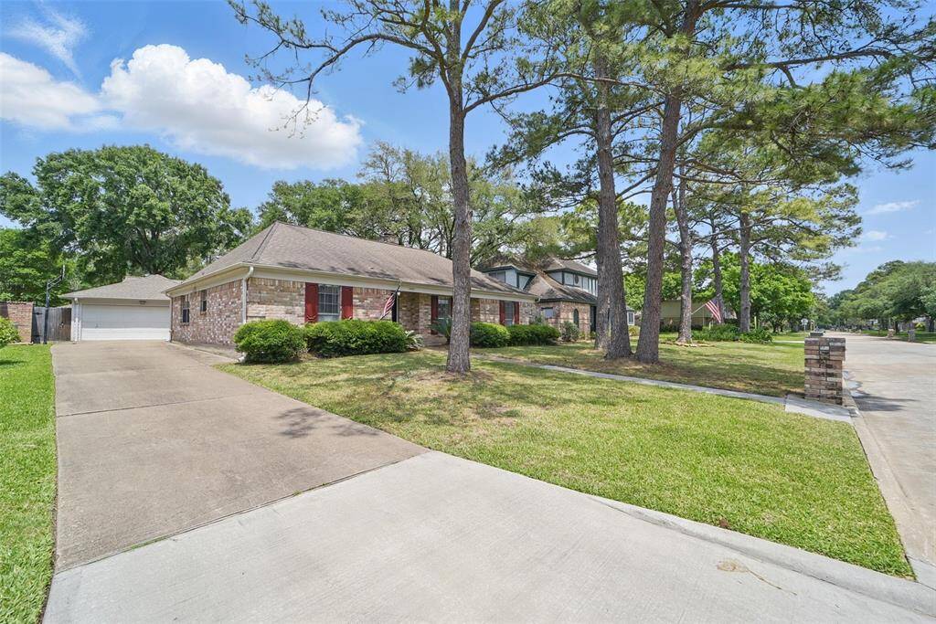 Enjoy mature trees, great landscaping and LAWN MAINTENANCE INCLUDED!!