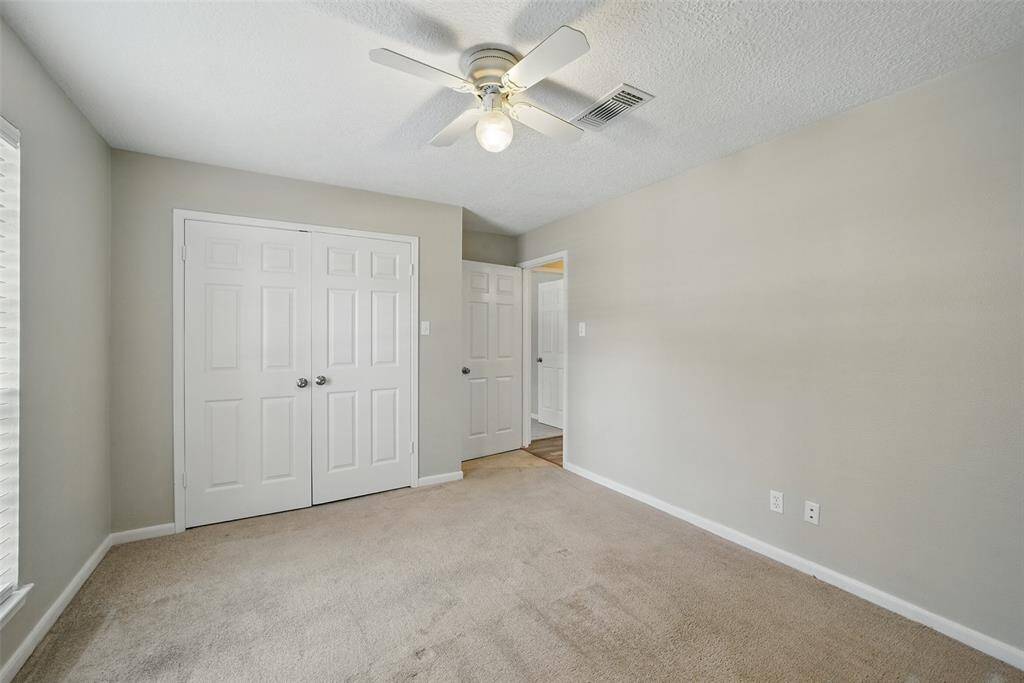Secondary bedroom with large closet.