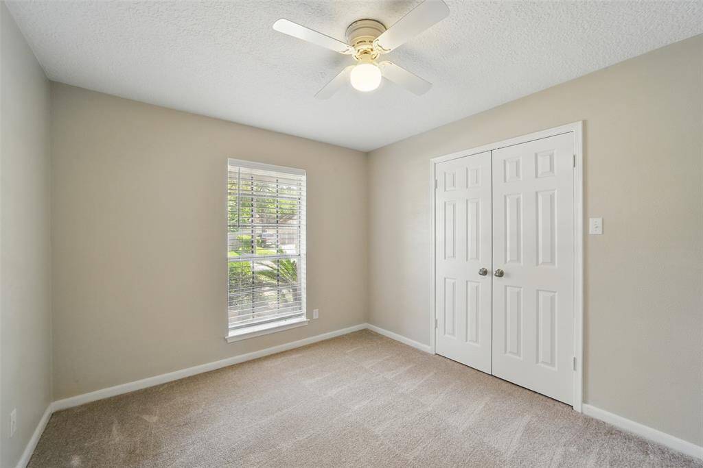 Secondary bedroom with large closet.
