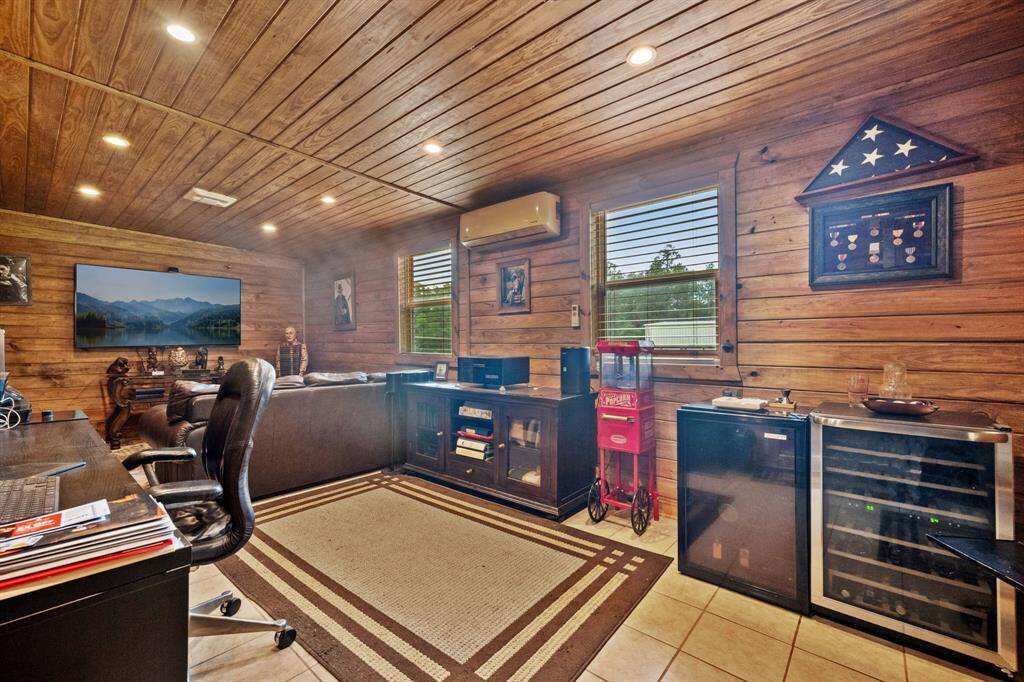 Ample and versatile space can be optimized for office space, craft room, or exercise room.