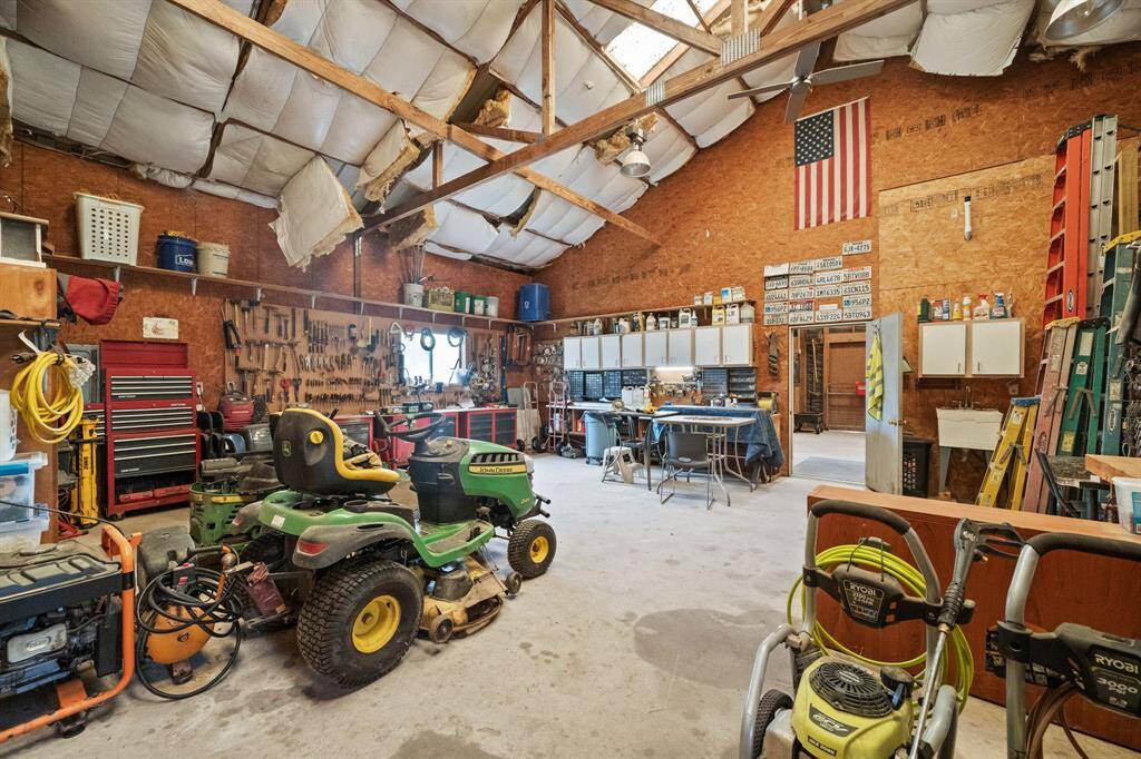 Barn entry way leading into horse stall towards back of the barn.