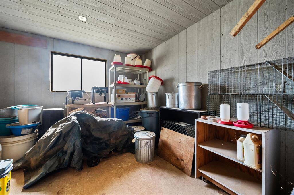 Room within the barn, can be used for storage or feed.