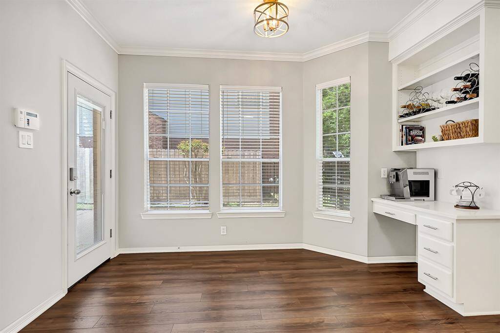Charming breakfast nook with a versatile built-in desk—ideal for morning coffee or remote work