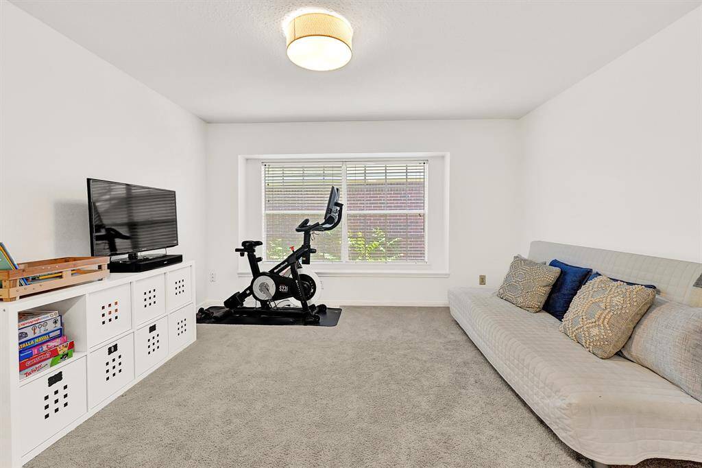 Versatile game room ideal for exercising and relaxation