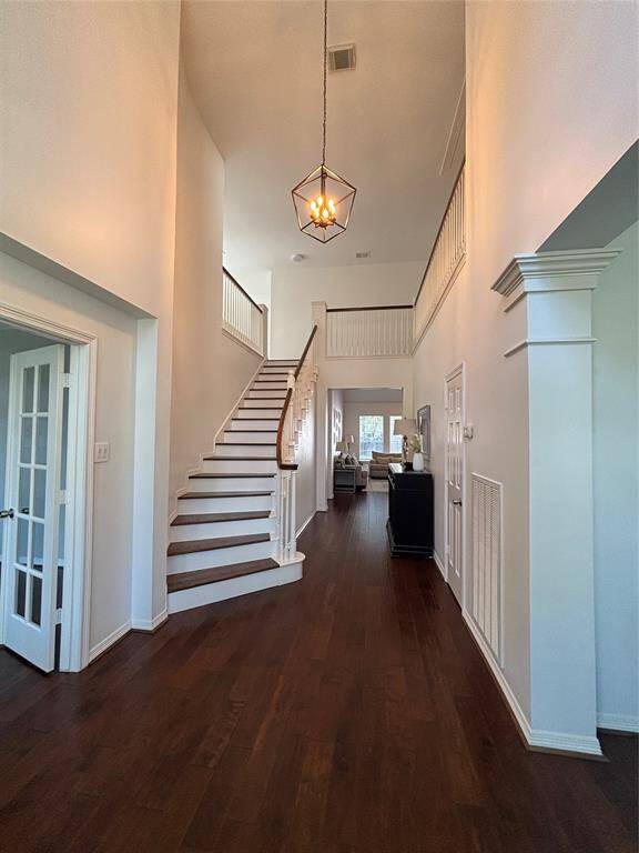 Welcoming foyer with elegant finishes and natural light.