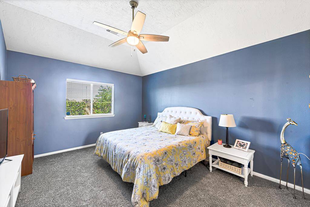 Primary bedroom will be repainted a neutral color before tenant move-in.
