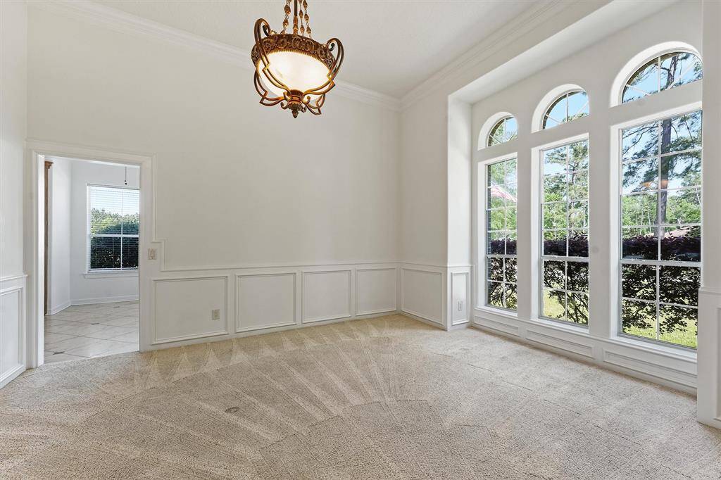 Formal dining room with plenty of natural light