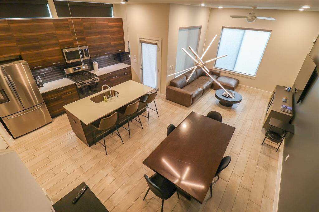 All appliances included! Fully furnished! Ideal for entertaining, the living room opens seamlessly to the kitchen area.