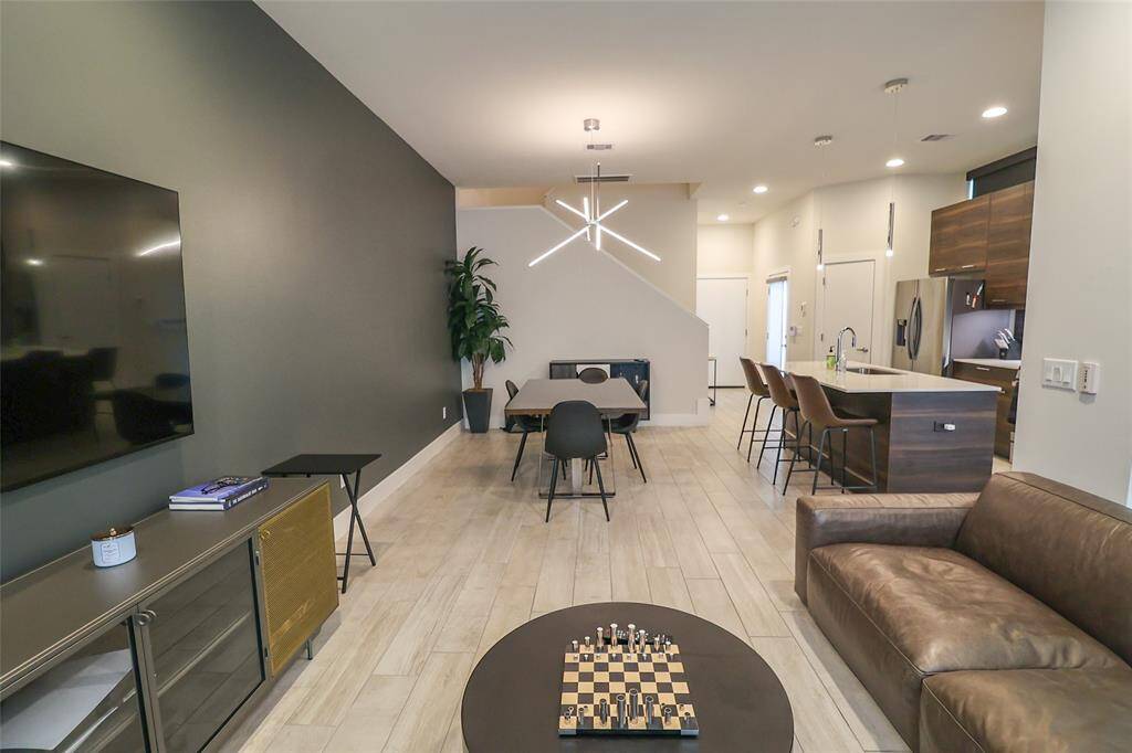 Kitchen opens to living room area.