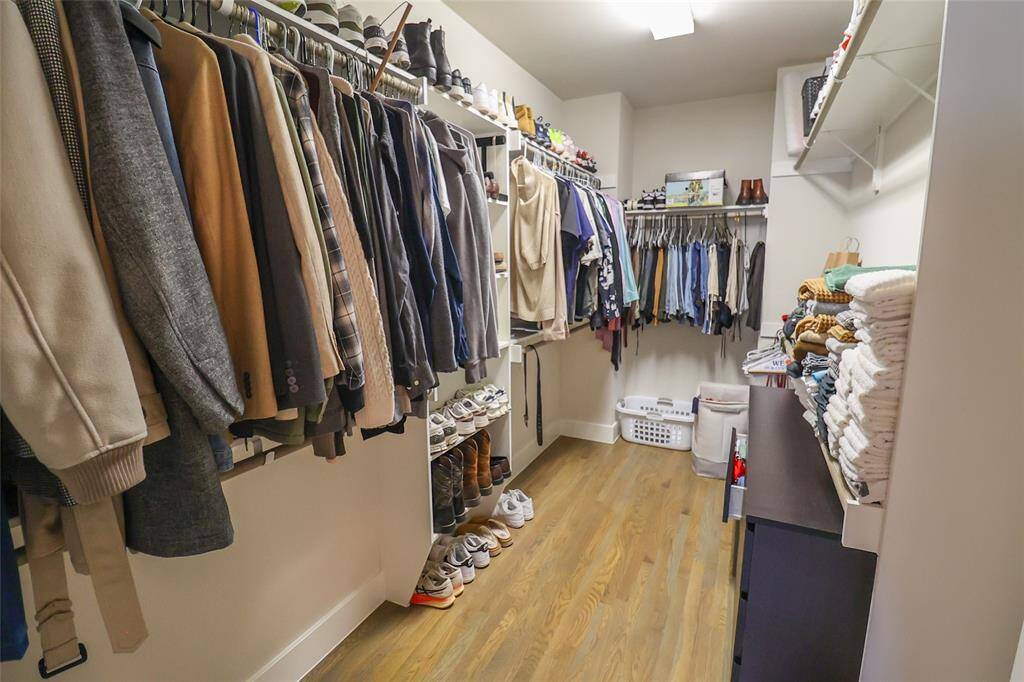 Large walk-in closet in master bedroom.
