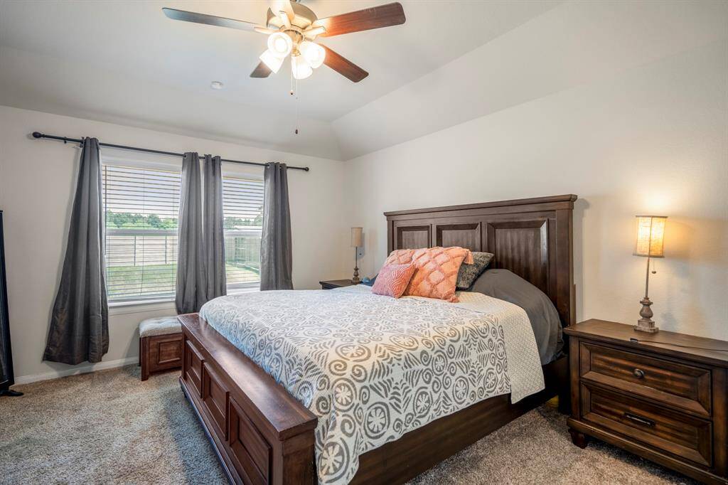 The primary en-suite bedroom has a great view of your large backyard!