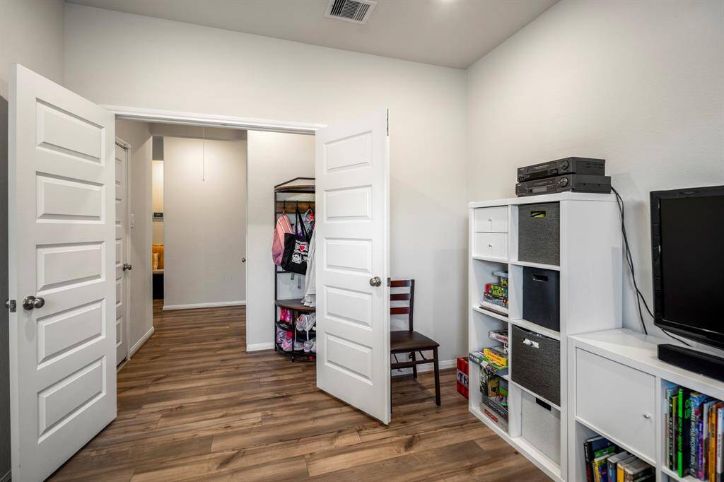 This bonus space is PERFECT for a home office or playroom.