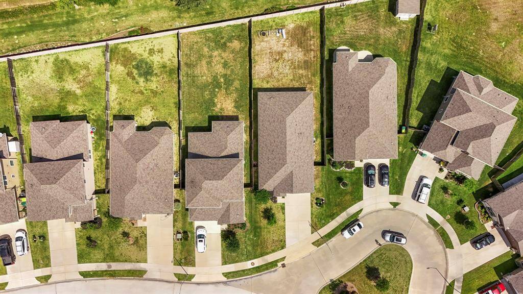 Aerial view of your new home and look at that yard!
