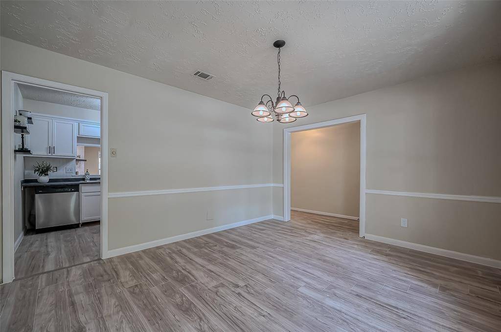 Alternate view of the formal dining room facing the interior of the house