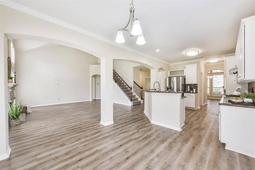 Spacious den is open to breakfast and kitchen.  Great for entertaining.