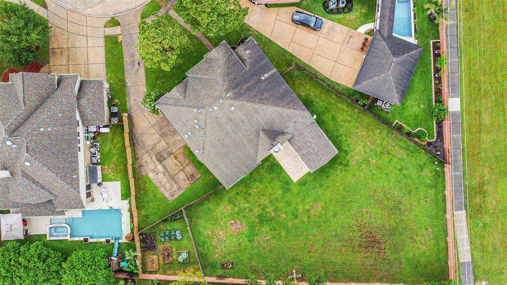 Aerial view of property.  Check out the fenced garden.