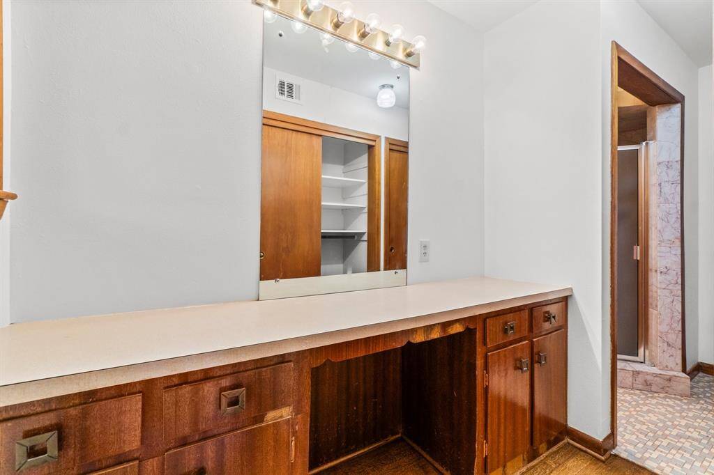 Vanity Space is perfect for putting on makeup or fixing your hair! This space is separate from shower and toilet area - very convenient!